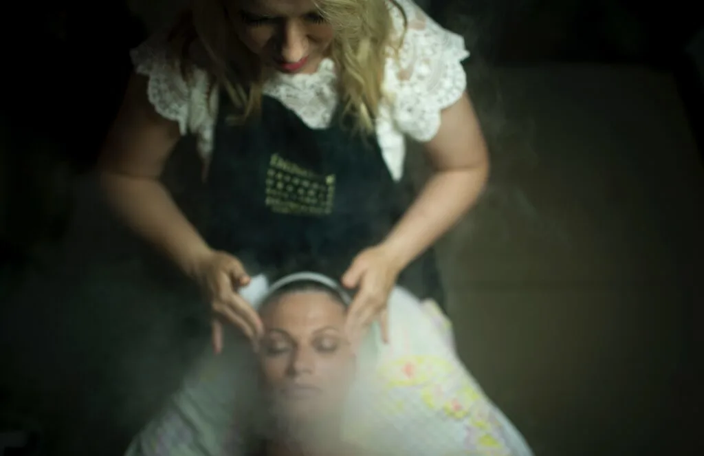 woman getting her temples massaged